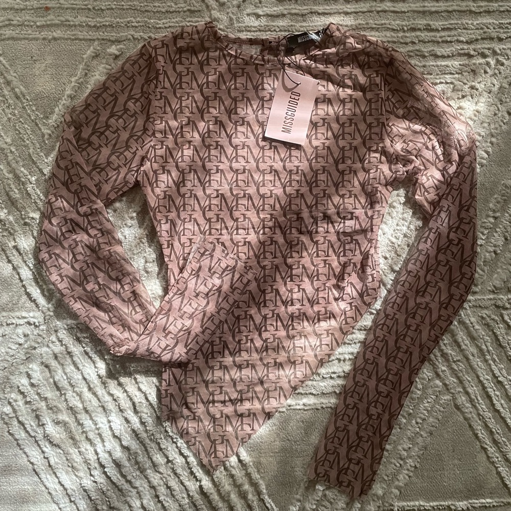 Mesh asymmetrical top